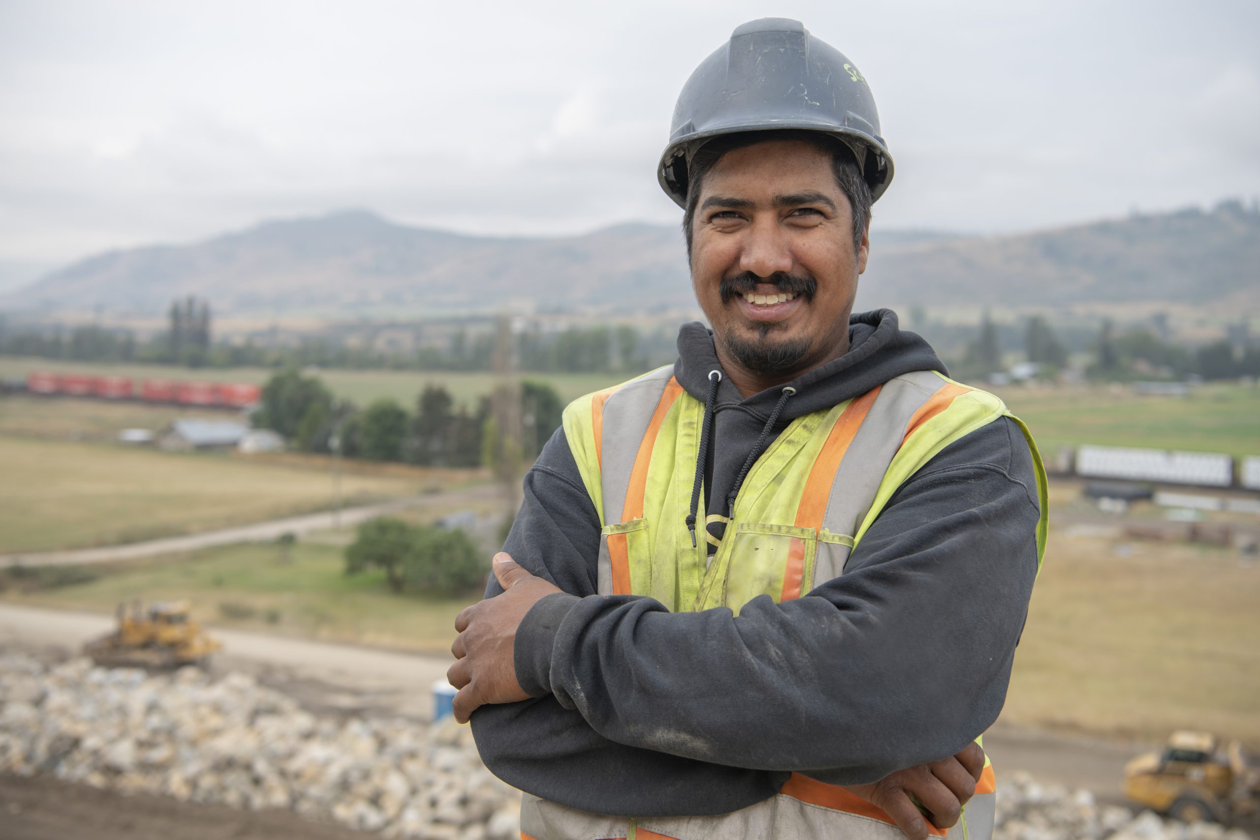 An image of a worker named Cody smiling
